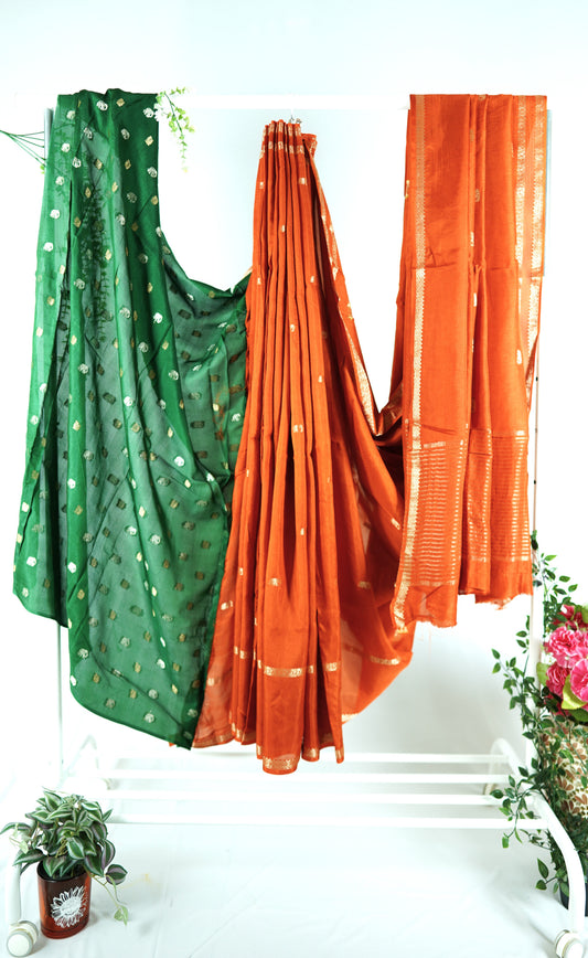 Rust orange viscose silk saree with green blouse