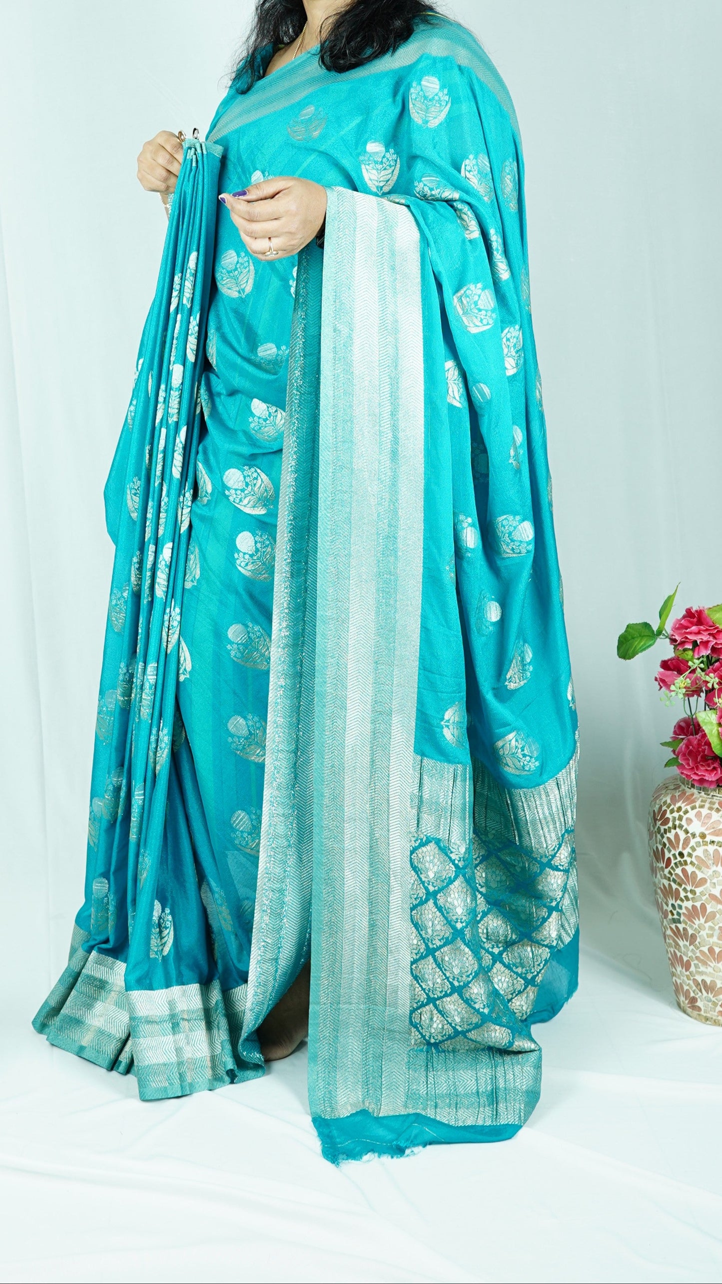 Pure georgette with gold and silver zari-Sea green