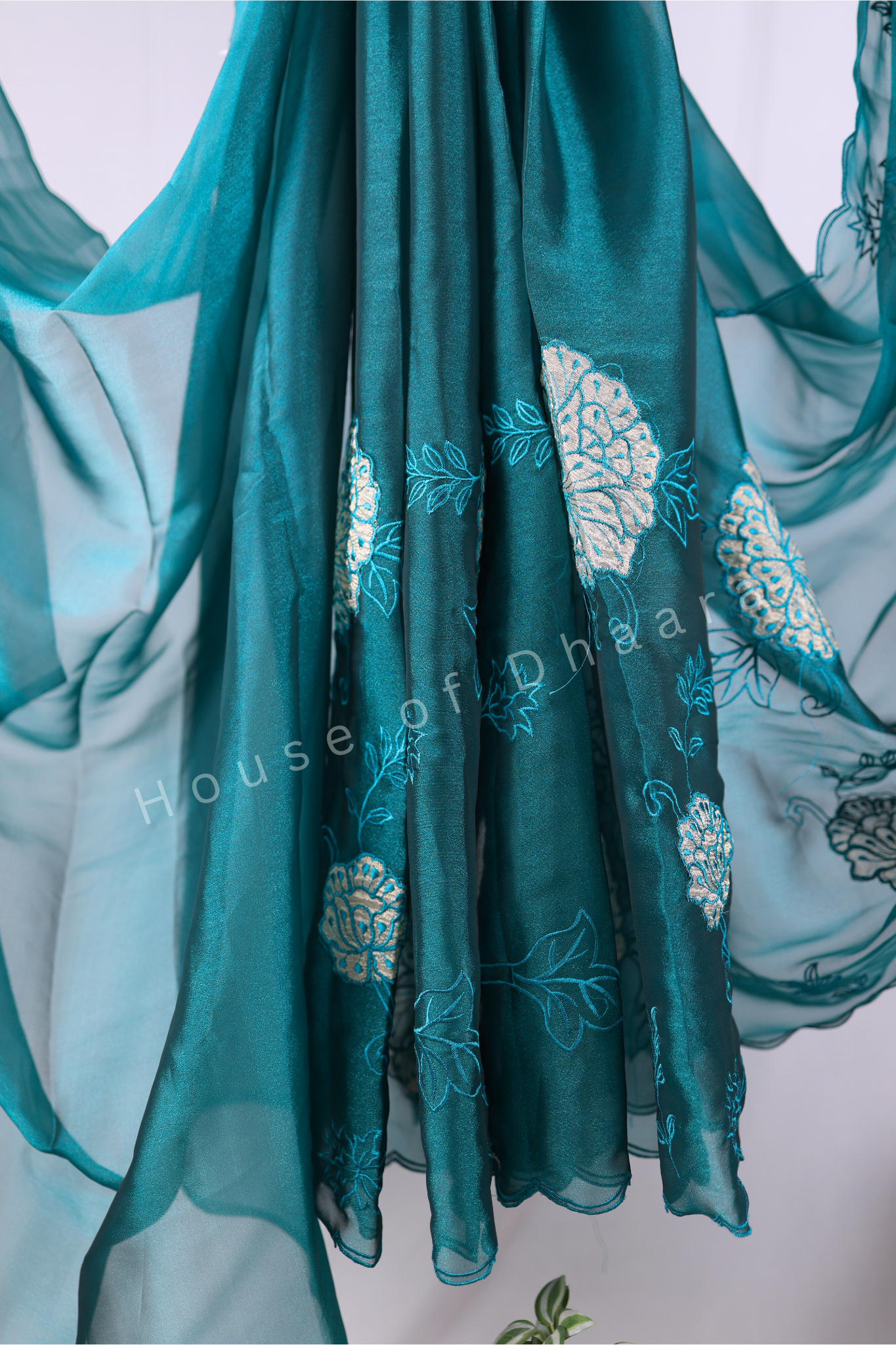 Teal green Soft organza tissue saree with applique work