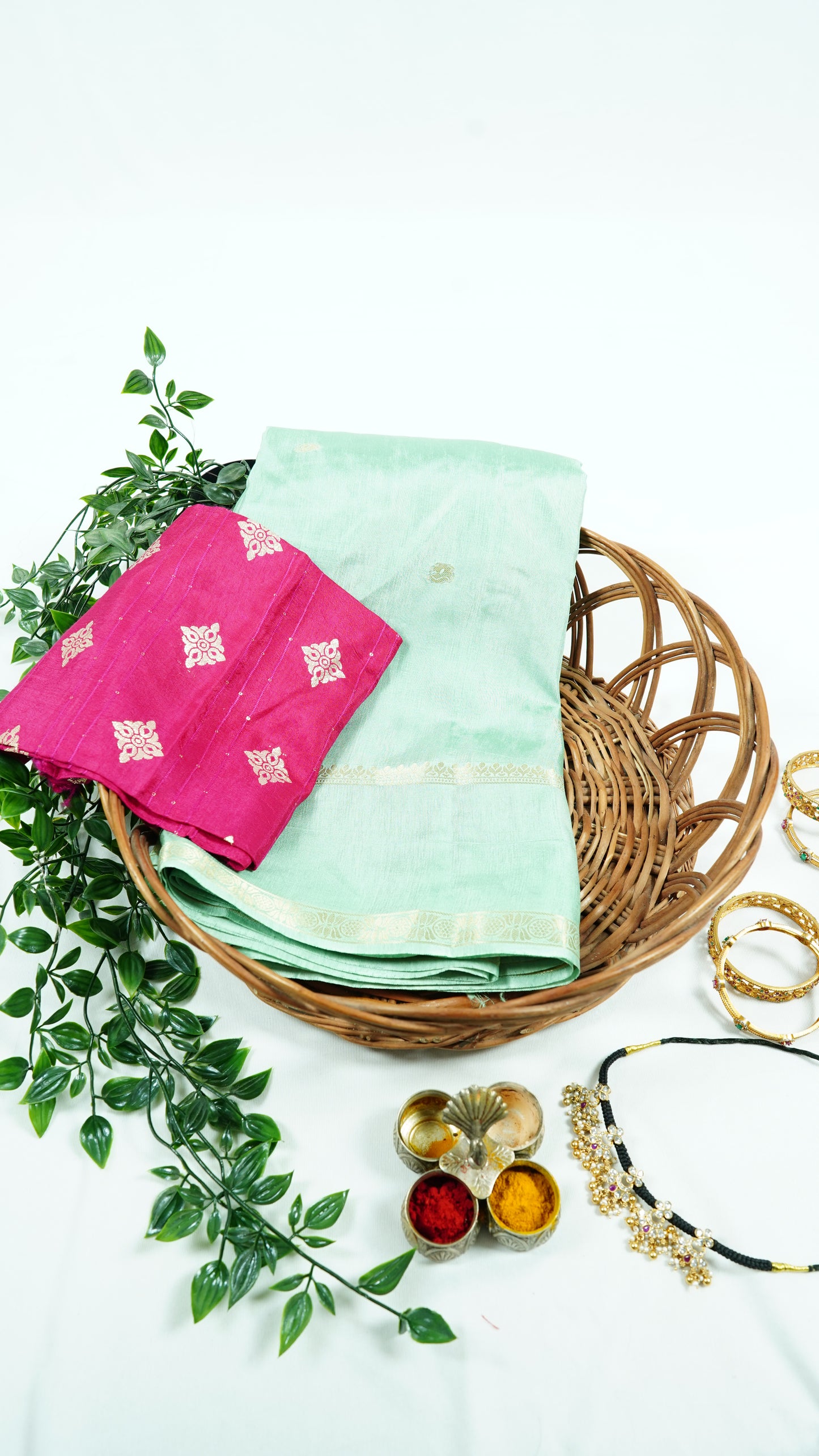 Pastel green viscose silk saree with pink blouse
