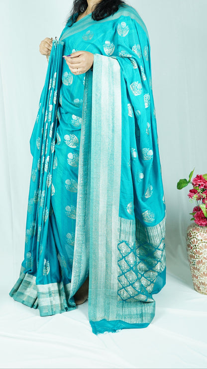 Pure georgette with gold and silver zari-Sea green