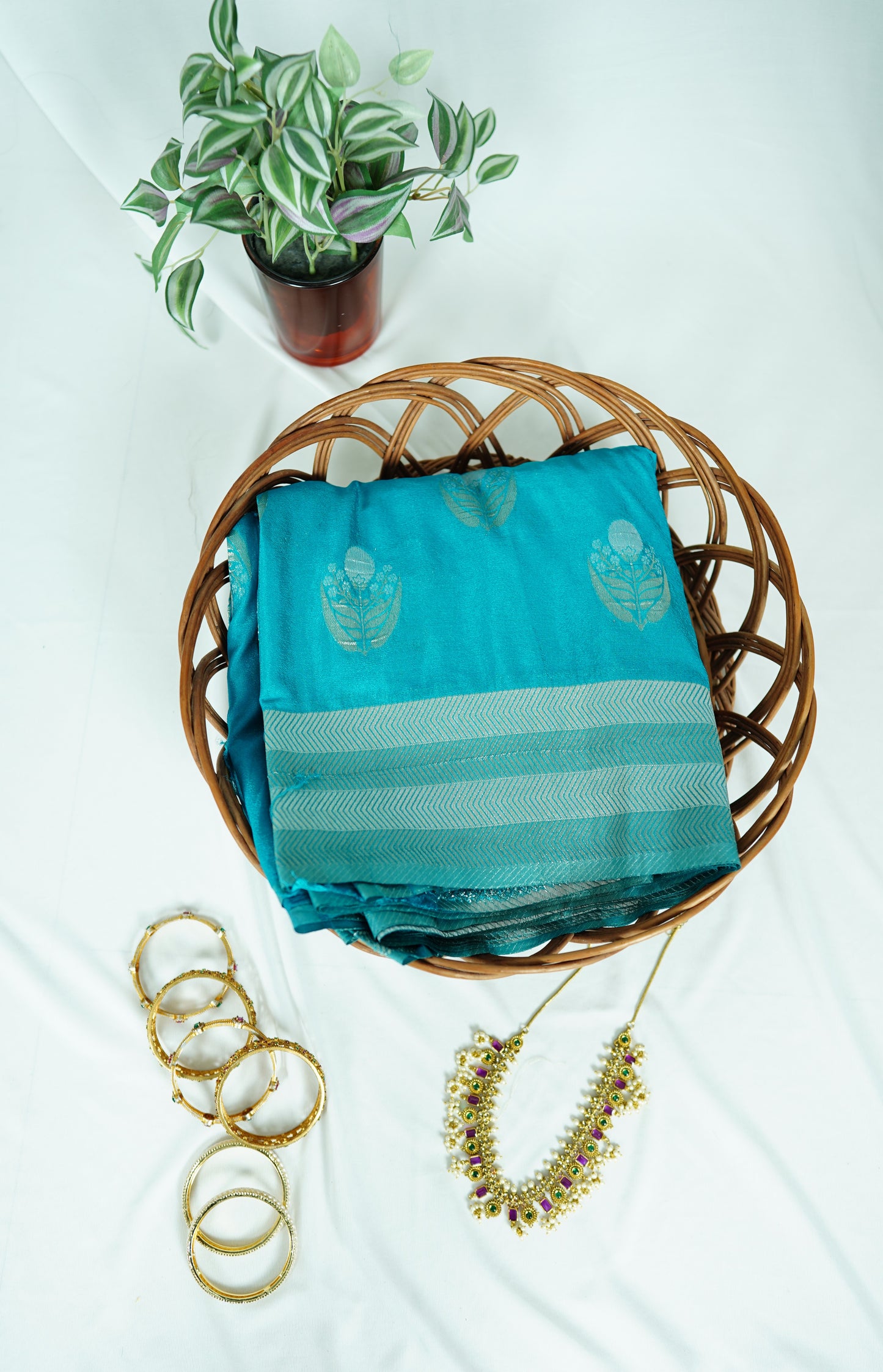 Pure georgette with gold and silver zari-Sea green