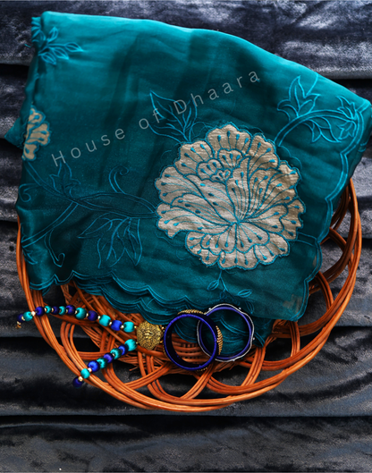 Teal green Soft organza tissue saree with applique work