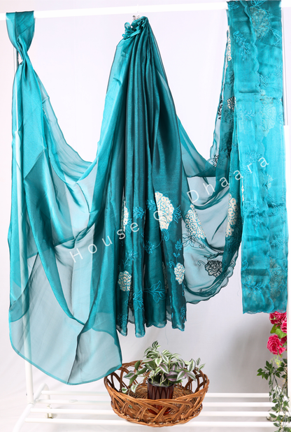 Teal green Soft organza tissue saree with applique work